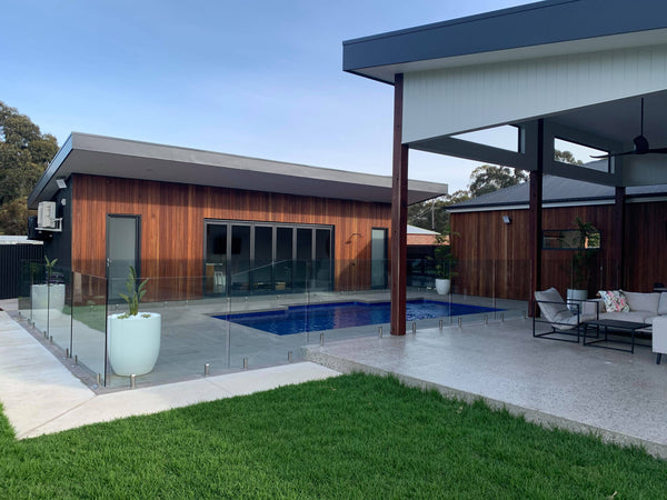 glass pool fencing on property